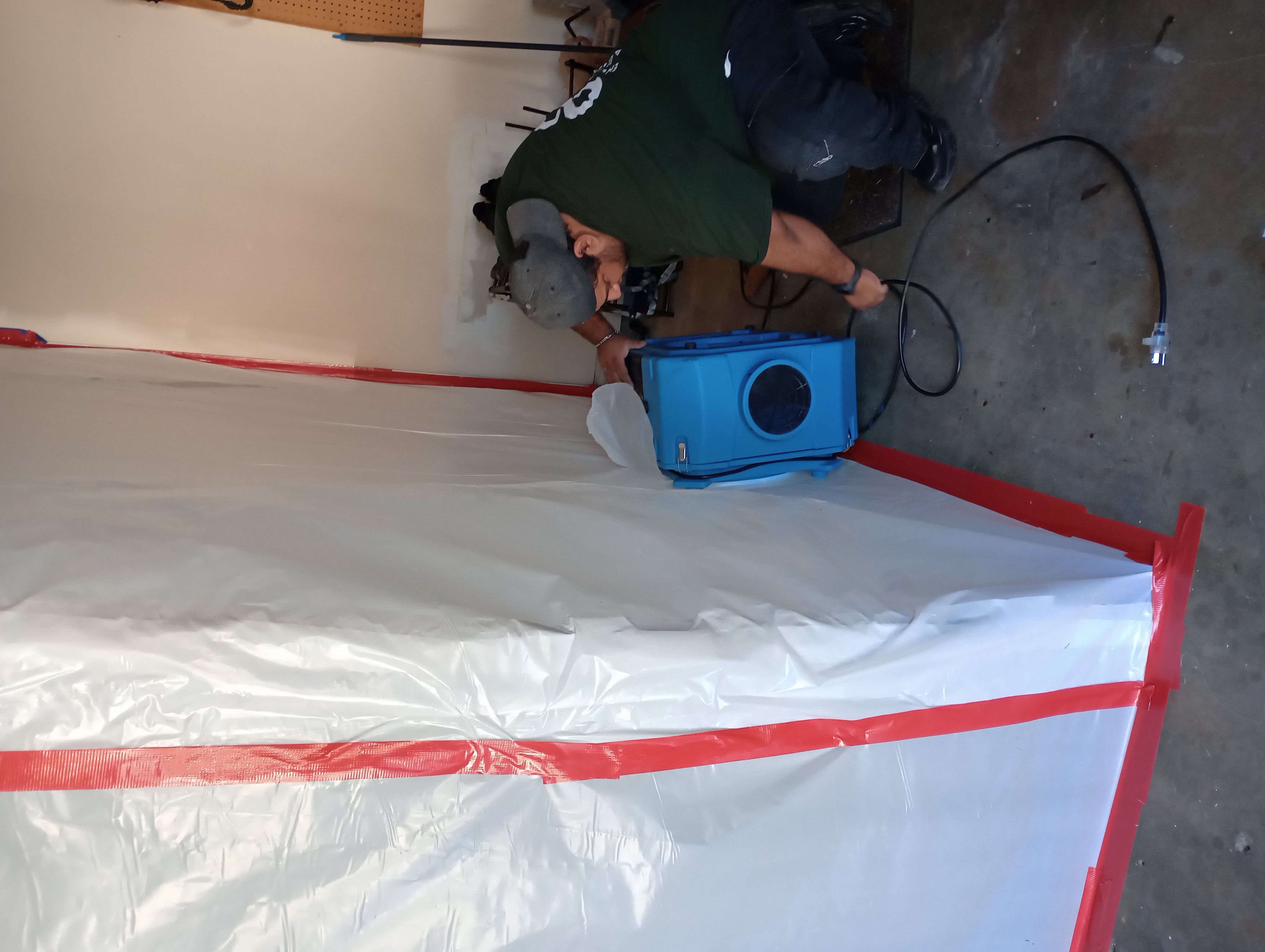 Mold remediation,  installing a air scrubber machine.